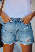 Elegantes shorts vaqueros de mujer con detalles desgastados y flecos