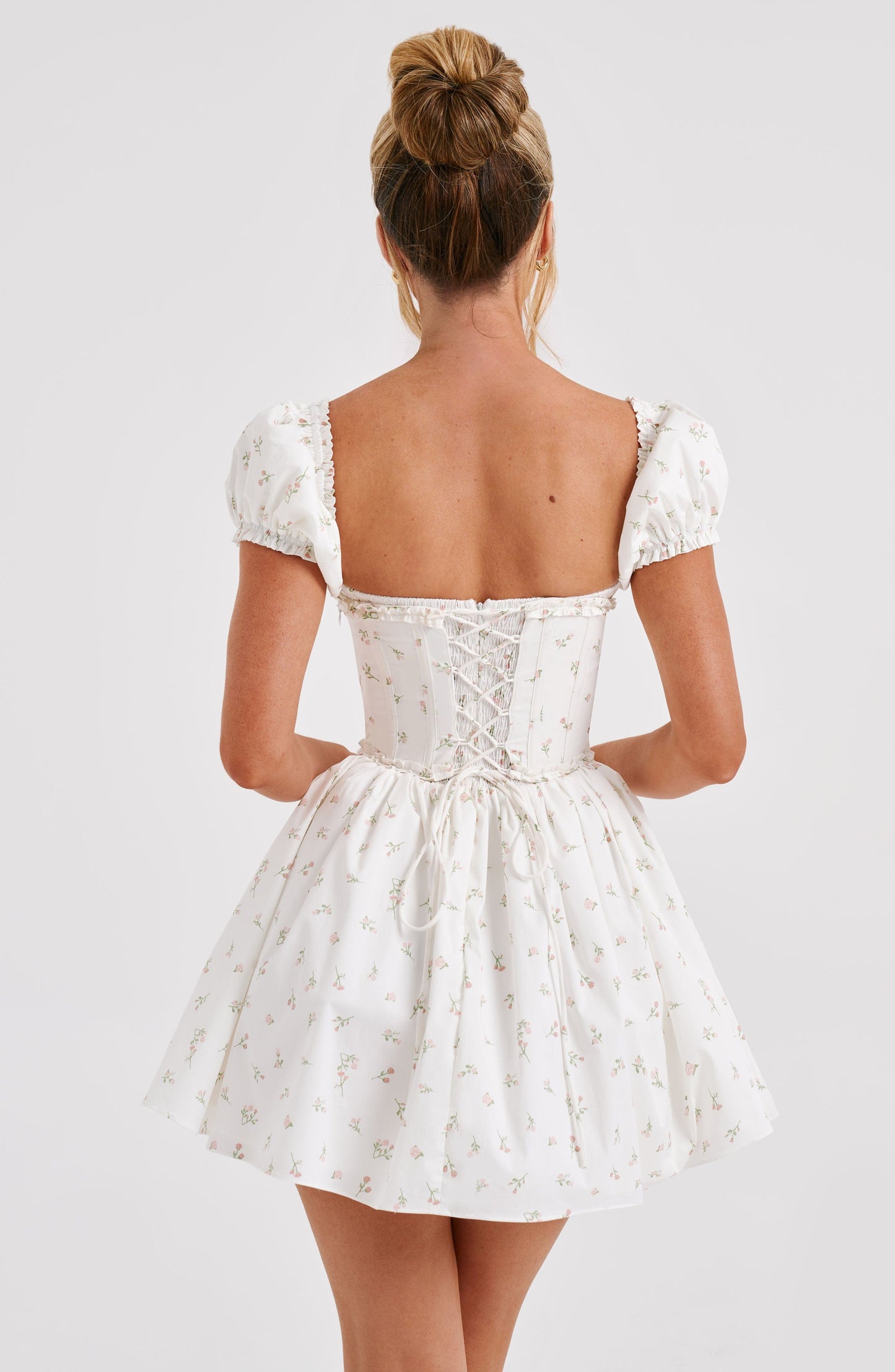 Luvrefashion | Penelope Blush Floral Print Mini Dress in XS - back view