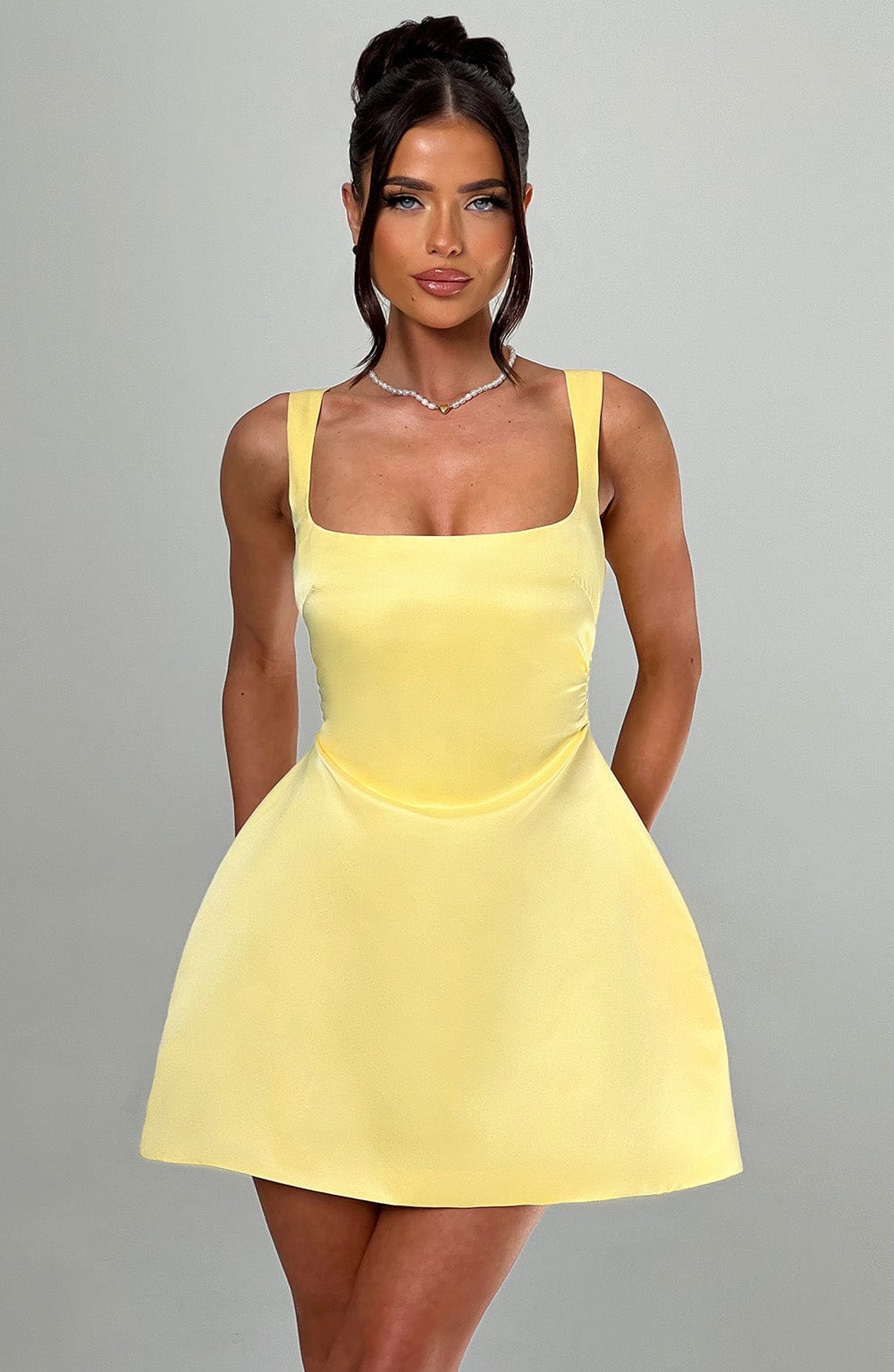 Luvrefashion | Sofie Lemon Mini Dress in XS - back view